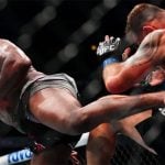 Jones stops Miocic with spinning kick to retain title