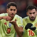 Spain beat Denmark to secure top stop in Nations League group